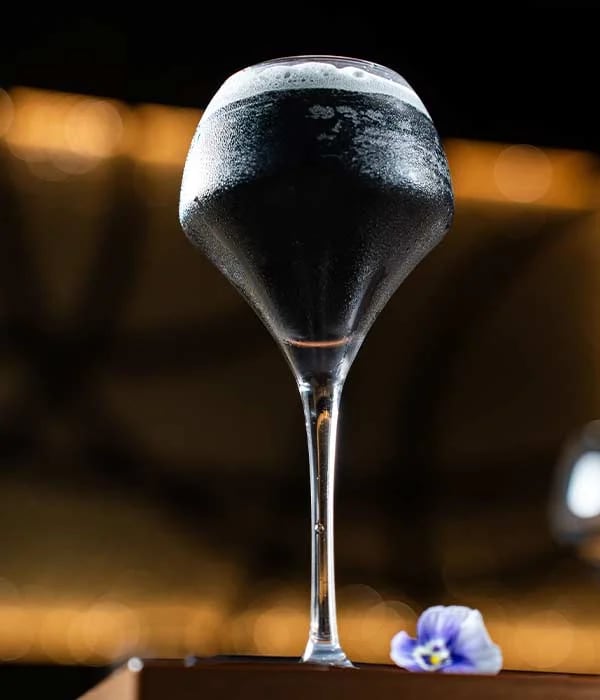 Incognito: the charcoal-black cocktail served in a coupe